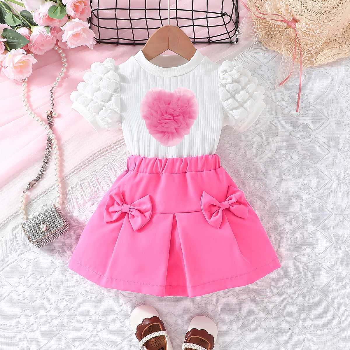 2025 New Girl Bubble Short Sleeved Top Love Bow Short Skirt Set Fashion Set Y250423lqyd