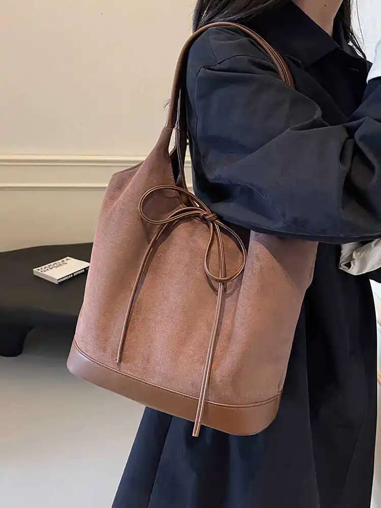 Suede Women's Underarm Bag 2025 New Fashion Bow Designer Handbag Autumn Retro Frosted Splicing Large Capacity Commuting Shoulder Bag