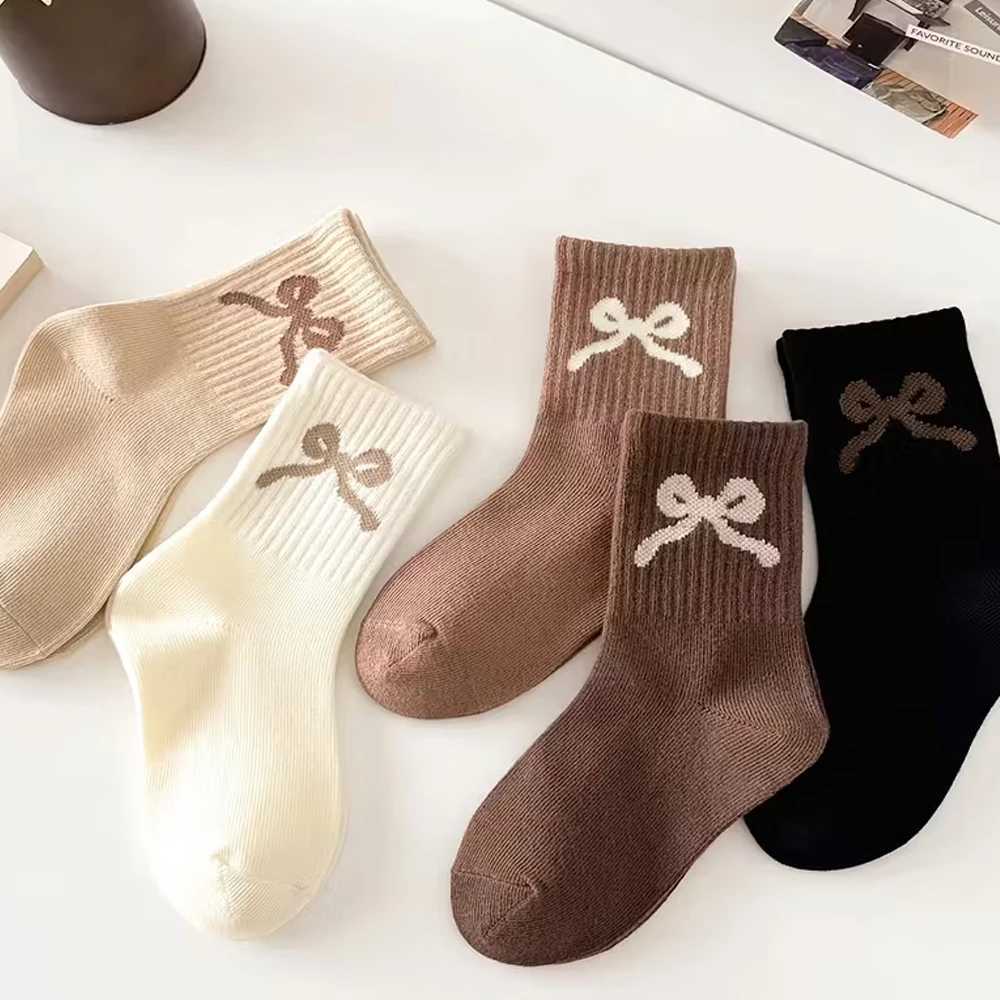 5 pairs stretchy solid-color sports socks for girls with bow patterns suitable for wearing in autumn and winter seasons G251124