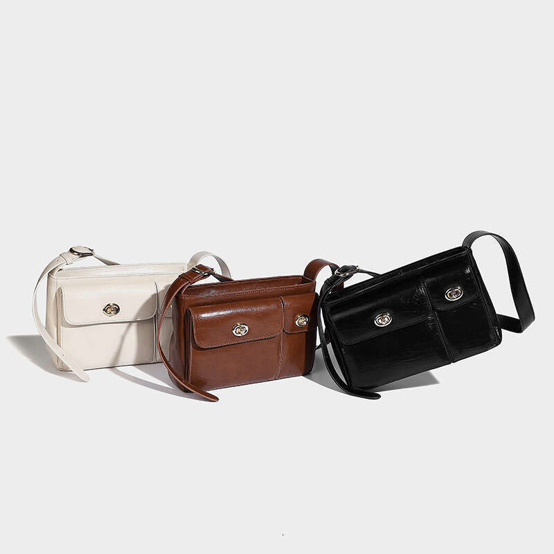 niche design twin autumn and winter new commuting versatile armpit diagonal cross double mouth mailman bag