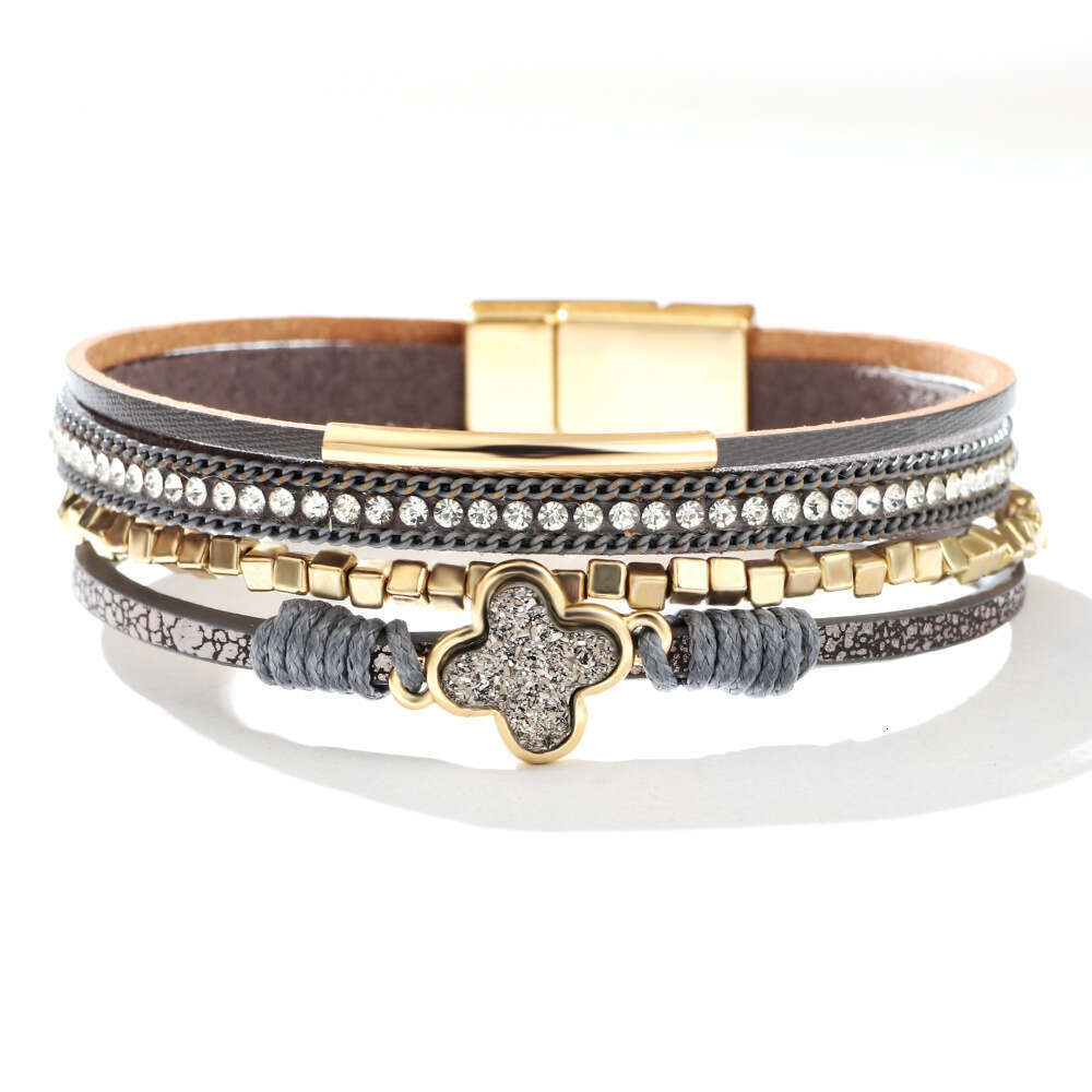 The new Bohemian four leaf clover studded dia multi-layer leather magnetic buckle is exquisite, fashionable, and high-end bracelet