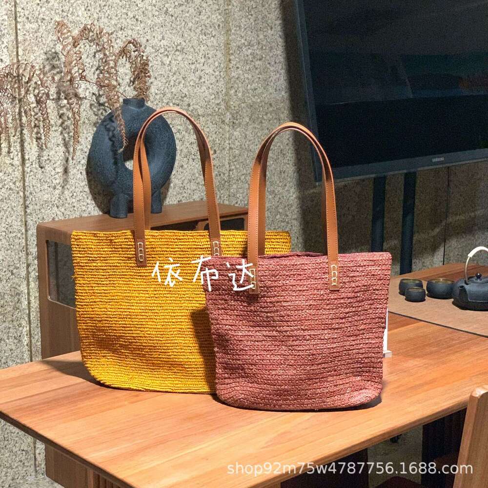 High quality Lafite patchwork leather strap shoulder bag, niche vacation style handmade grass woven tote bag