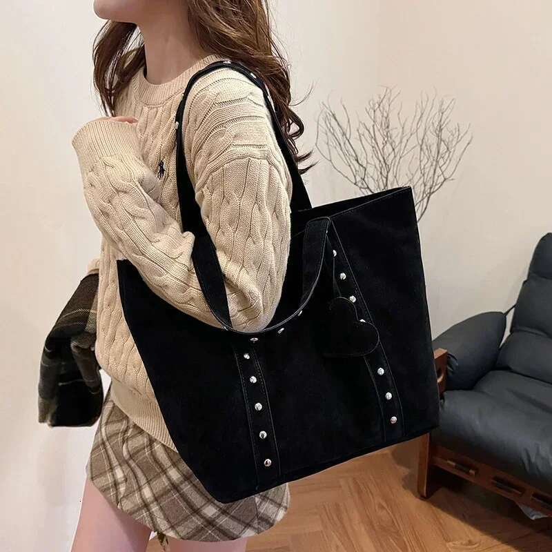 Designer Bag Fashion Suede Sewing Thread Solid Color Shoulder Bags 2025 Hot Sale Retro Versatile Commute Simplicity Single Women's Handbag