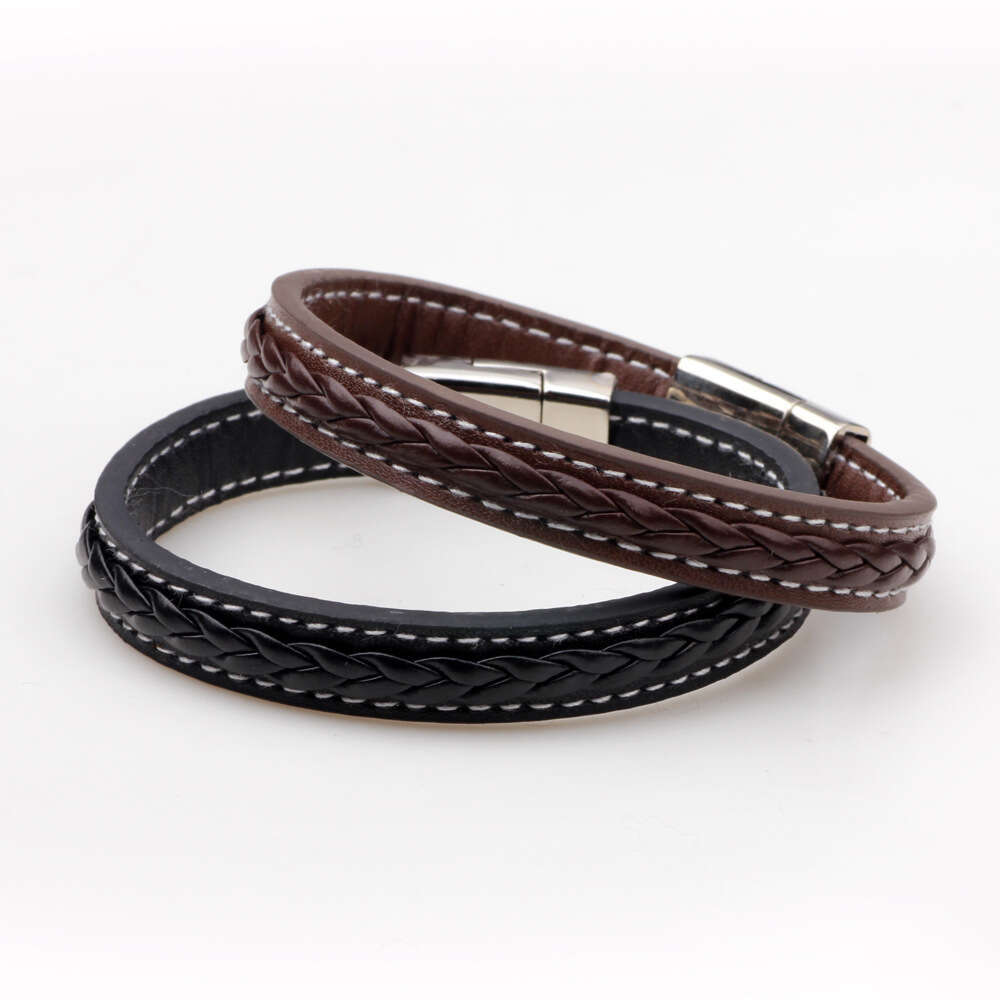 A minimalist PU woven that is fashionable, classic, punk, and trendy for men. The wide leather bracelet has a high-end feel