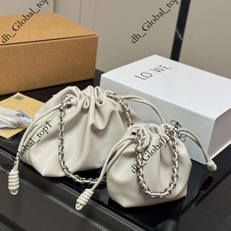 Detail designer Fashionable luxury lowetank Designer handbag Black Leather Drawstring Bags with Gold Tone Chain Straps, Showcasing quality luxury lowev Bag 9bb