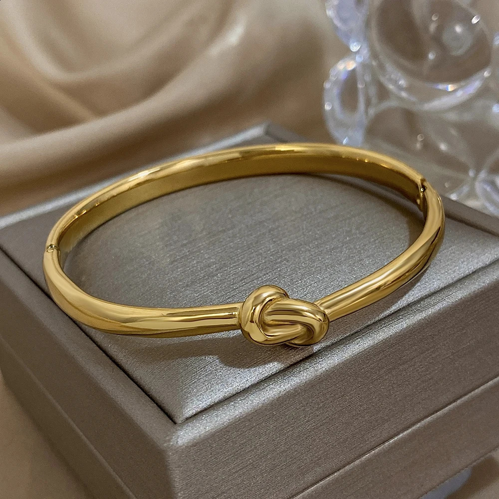 Simple thin stainless steel knot bracelet suitable for women unisex style gold cuffs waterproof and stackable jewelry gift 250415