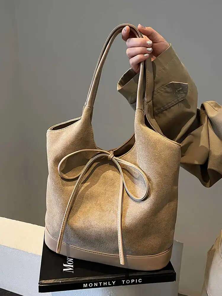Suede Women's Underarm Bag 2025 New Fashion Bow Designer Handbag Autumn Retro Frosted Splicing Large Capacity Commuting Shoulder Bag
