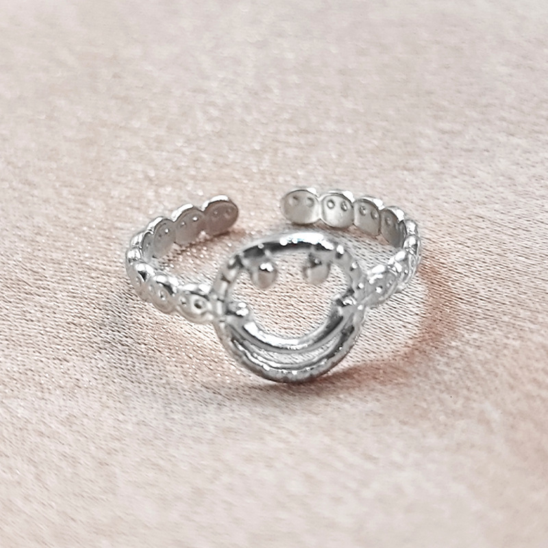 Top Source Korean version creative hollow smiling face titanium steel for women's fashion trendsetters, chain opening food ring