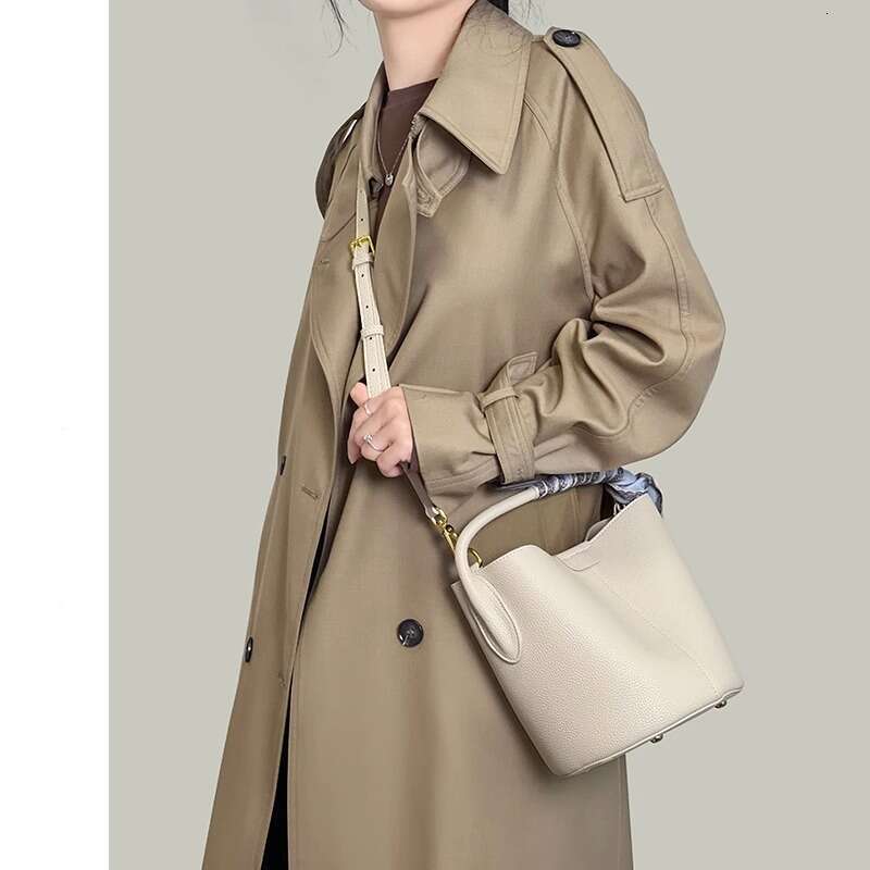Small Niche Single Shoulder Bucket New High End Sensory Vegetable Basket Hand Held Women S Work Commuting Crossbody Bag For Women