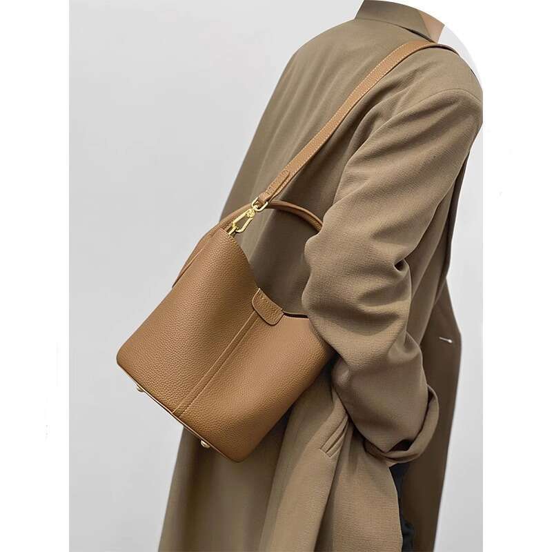 Small Niche Single Shoulder Bucket New High End Sensory Vegetable Basket Hand Held Women S Work Commuting Crossbody Bag For Women