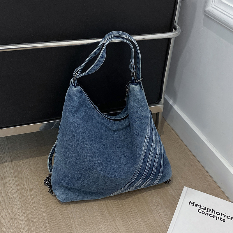 designer bag designer bag Large capacity denim tote for women in spring 2025, new casual commuting armpit bag, simple single shoulder crossbody bag