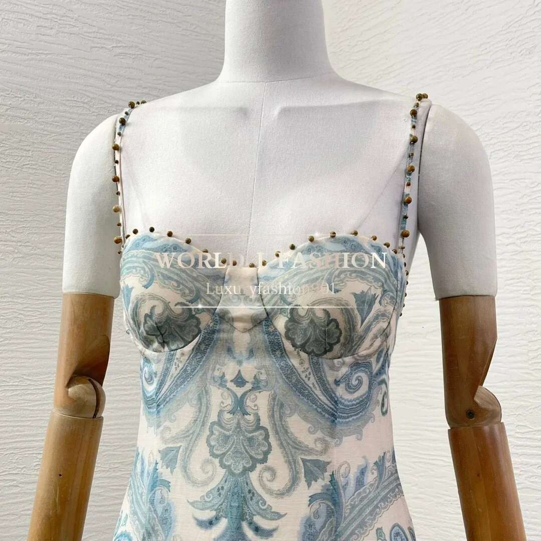 2025 New Fashion Blue Paisley Print Sleeveless Mermaid Hem Ruffles Beading Midi Dress