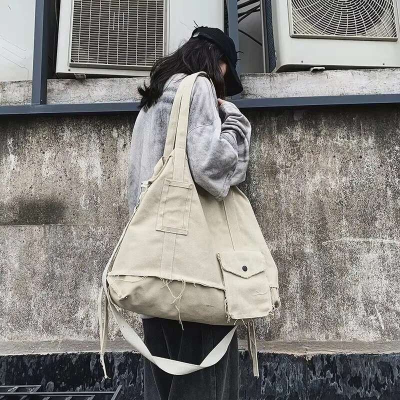 Designer Bag Large Capacity Shoulder Unisex 2025 New In High Quality Solid Color Canvas Tassel Crossbody Bag Street Trend Hip-Hop Handbag