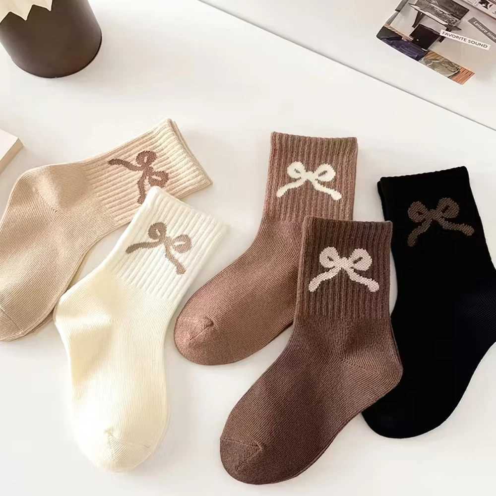 5 pairs childrens high-elasticity solid-color sports socks with bowknot patterns suitable for autumn and winter G251124