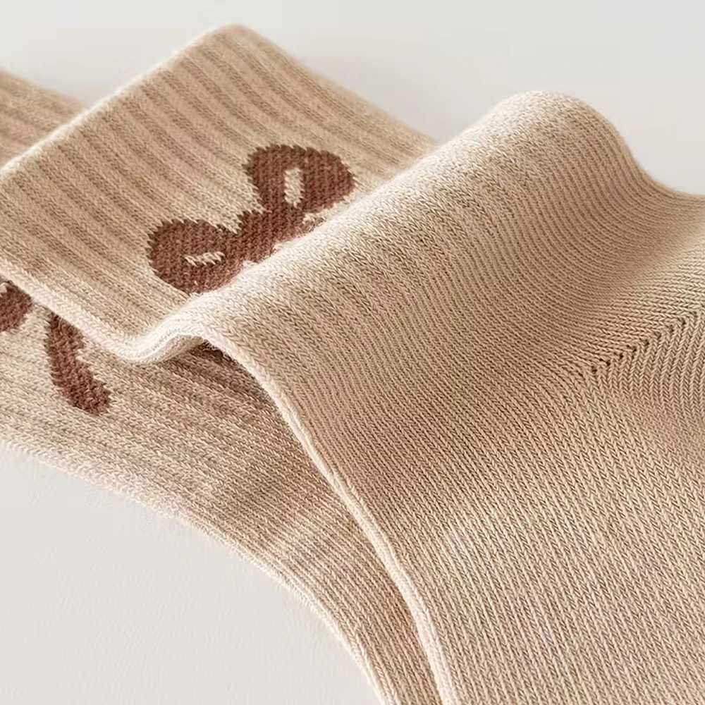 5 pairs childrens high-elasticity solid-color sports socks with bowknot patterns suitable for autumn and winter G251124