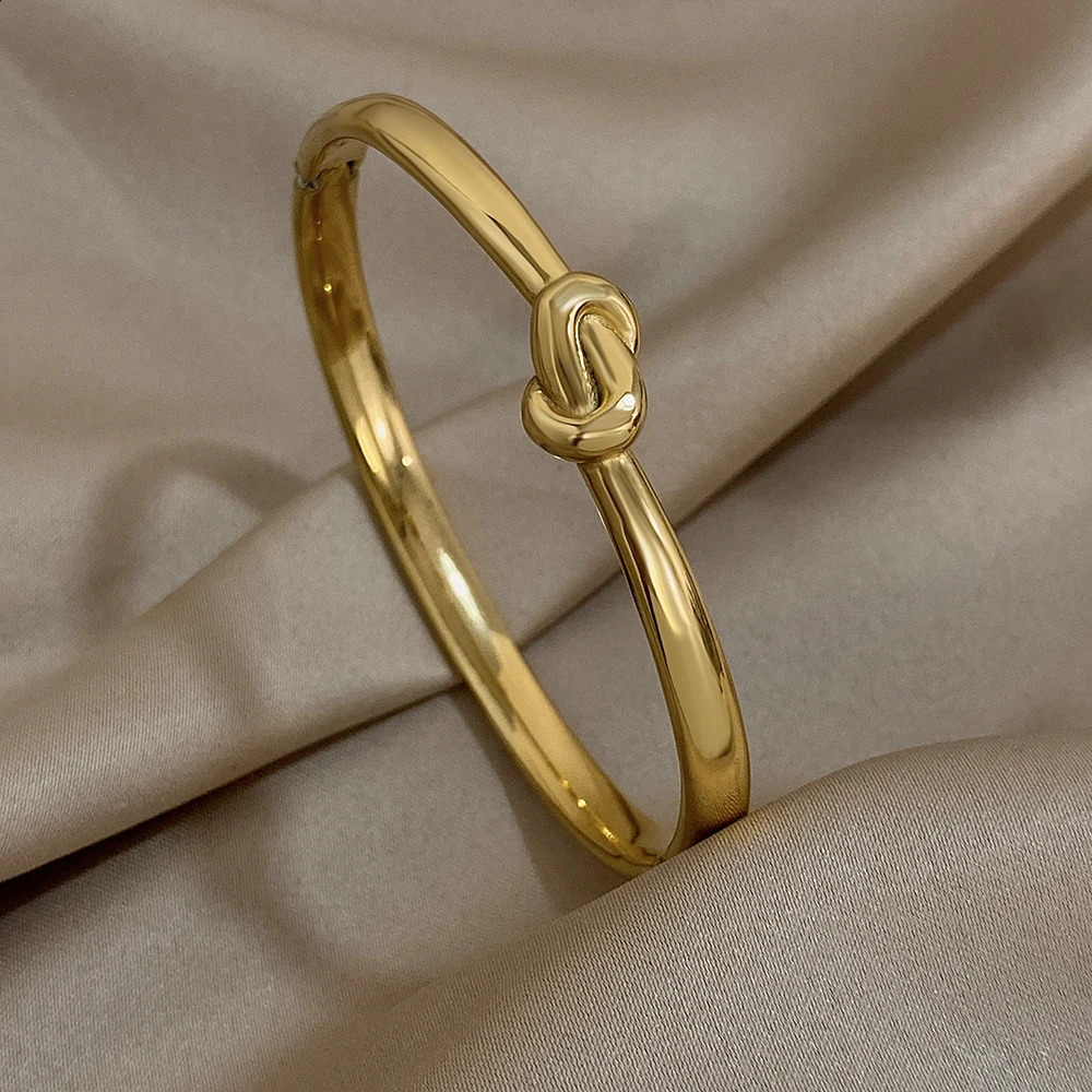 Simple thin stainless steel knot bracelet suitable for women unisex style gold cuffs waterproof and stackable jewelry gift 250415