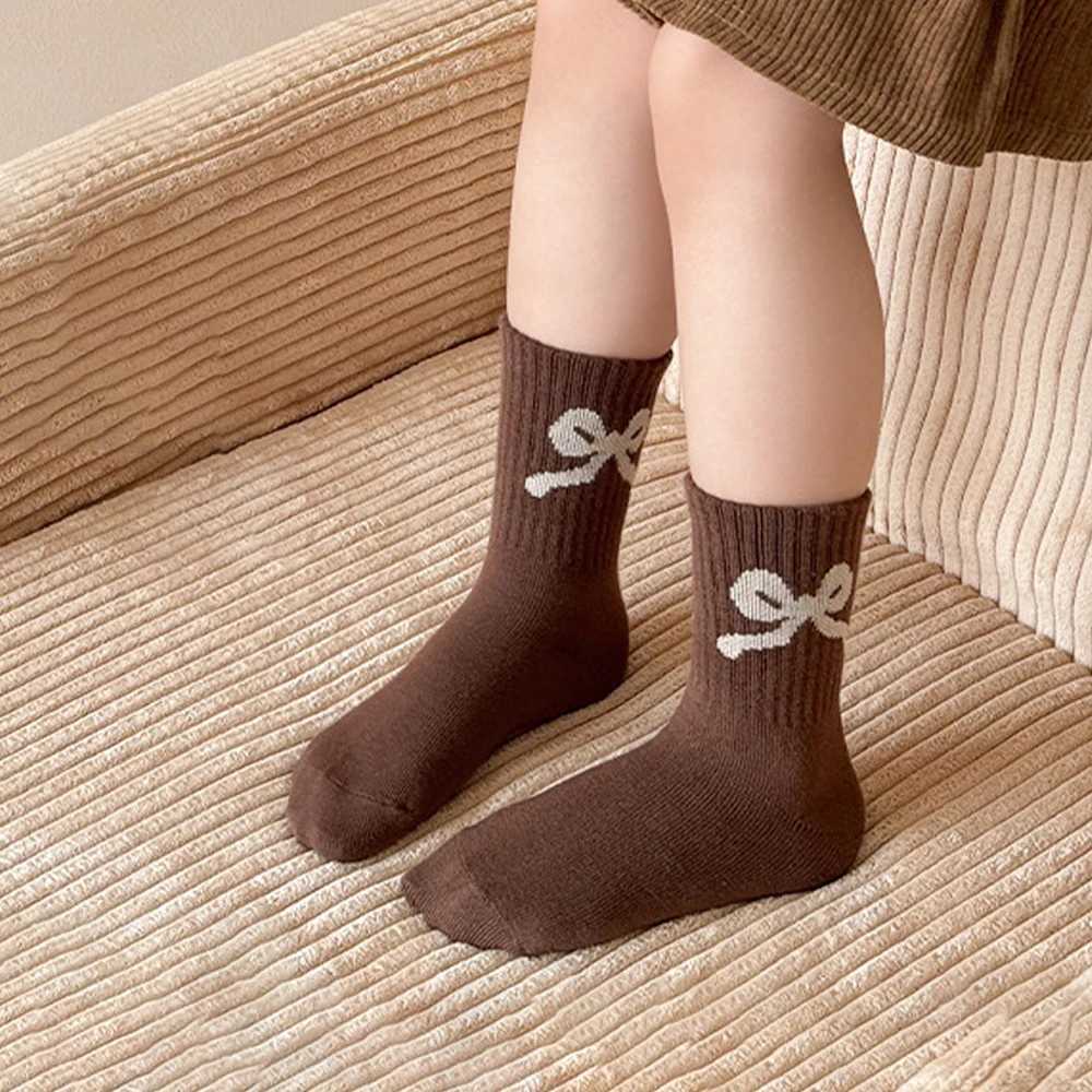 5 pairs stretchy solid-color sports socks for girls with bow patterns suitable for wearing in autumn and winter seasons G251124