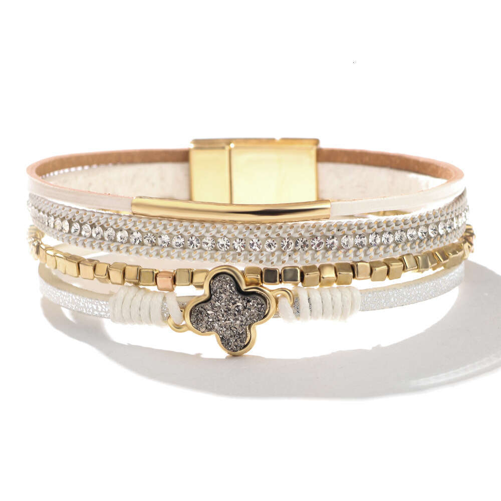The new Bohemian four leaf clover studded dia multi-layer leather magnetic buckle is exquisite, fashionable, and high-end bracelet