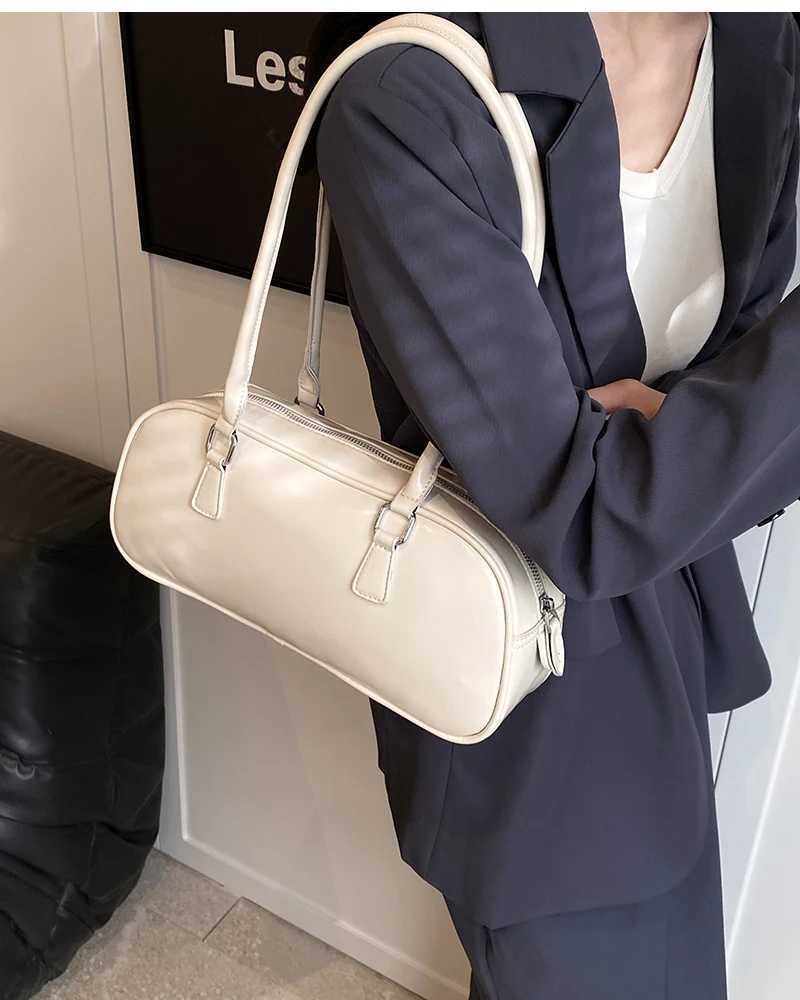 Solid color PU leather womens underwear bag 2024 spring Korean fashion retro simple shoulder bag womens handbag and wallet W250421