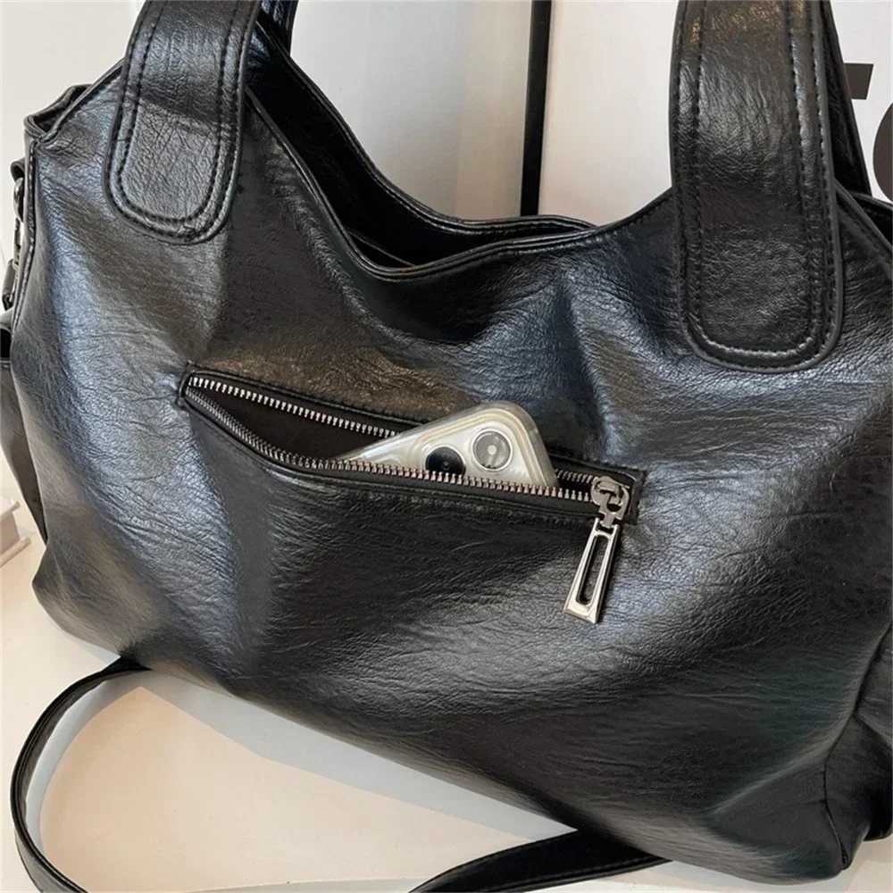 Soft indoor company shoulder bag 2025 high-quality contrasting color womens fashionable zipper Pu womens handbag W250421