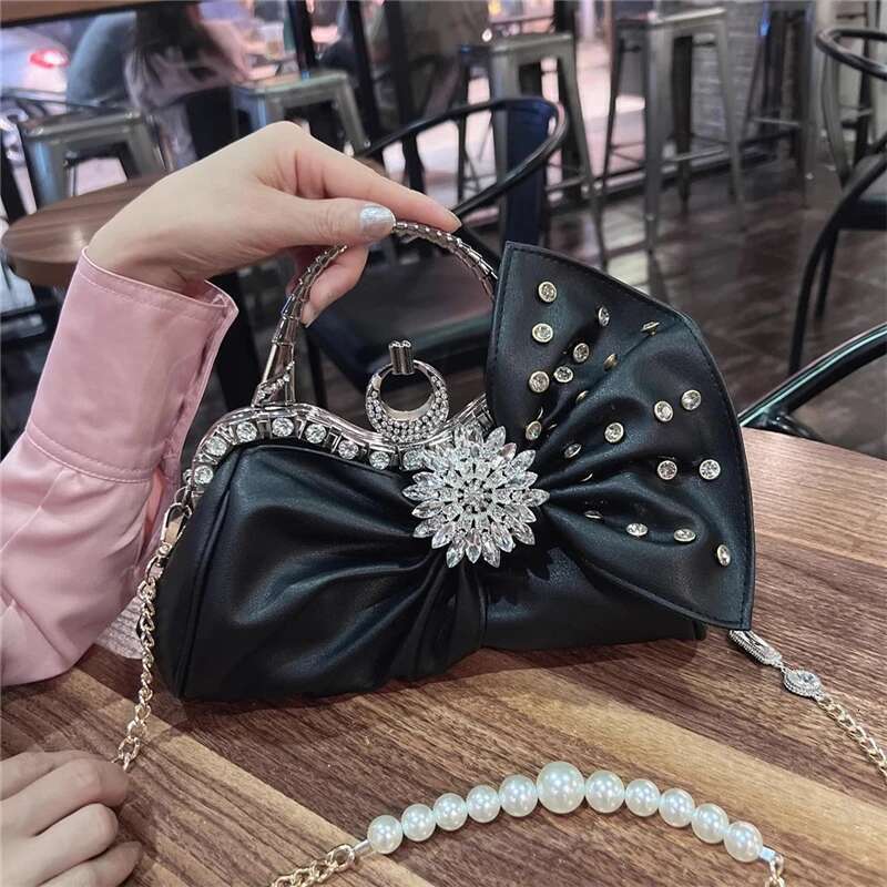 Spring and summer new rhinestone rivet wrinkled bow pearl handbag banquet dress one-shoulder cross-body chain women's bag