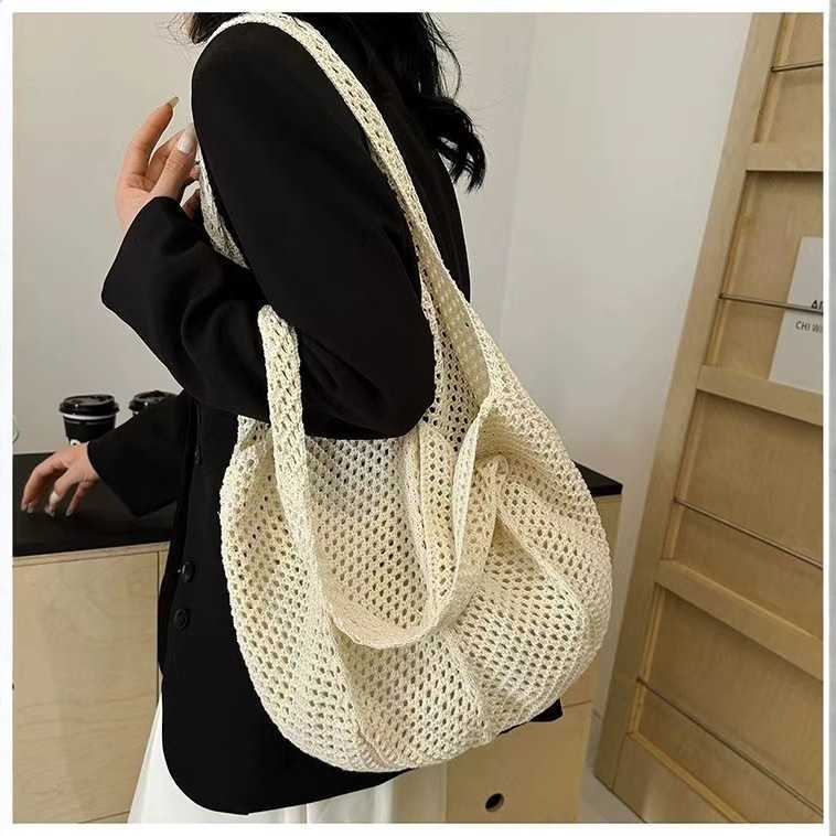 New Summer Trendy Woven Womens Bag Handheld Woven Bag Fashion Western Single Shoulder Mesh Bag Seaside Travel Straw Weaving