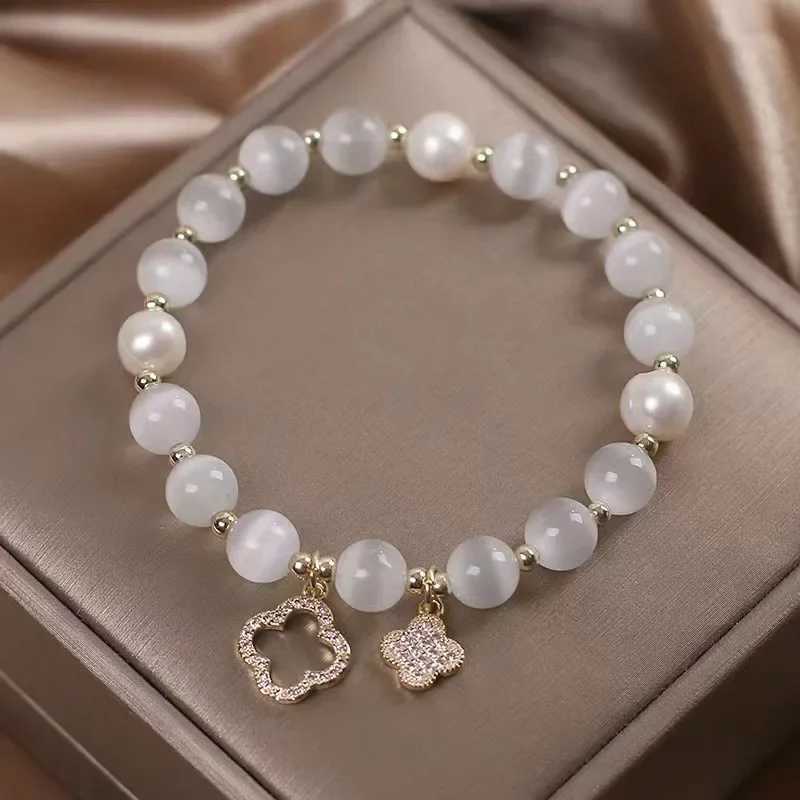 Womens Lucky Four-Leaf Flower Crystal Bracelet Elastic Rope Pearl Transfer Bead Hand Chain Jewelry Bangles Gift J251125