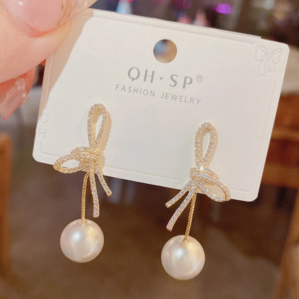 micro inlaid zircon bow hanging pearl earrings suitable for women to look slim 250422