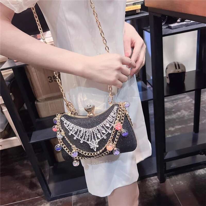 Spring and summer new rhinestone sequin pearl buckle handbag banquet dress versatile one-shoulder cross-body chain women's bag