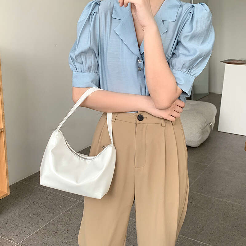 Korean sier commuting style armpit women's simple fashionable handbag, high-end sense, niche and one shoulder dumpling bag, 2025 temperament vers
