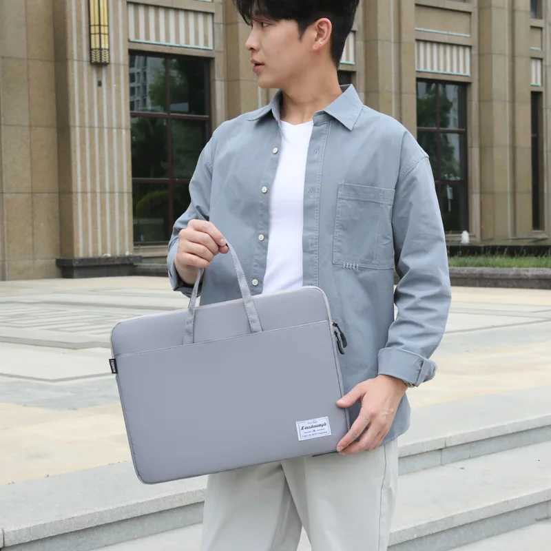 Fashionable and casual niche handbags simple and lightweight computer bags 2025 summer new fashion business bagsT251125