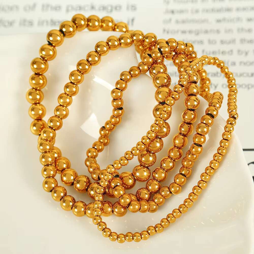 DHCollections JEWELRY SL60 Hot Sale Bean Beaded Hundred Titanium Steel Plated Gold Round Beads Stretch Bracelet