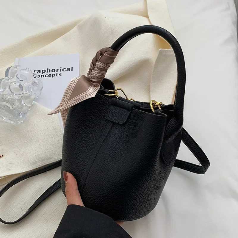 High quality bucket bag womens cross shaped bag fashionable mini shoulder messenger bag womens handbag design shoulder bag Z250425