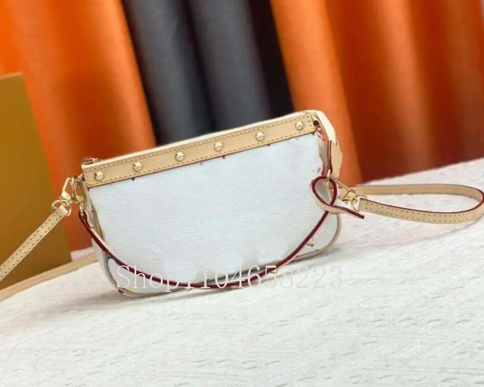 2025 High Quality Women's Bag New Handbags Rivet Real Leather Shoulder Cross Bags Size 22*13Cm