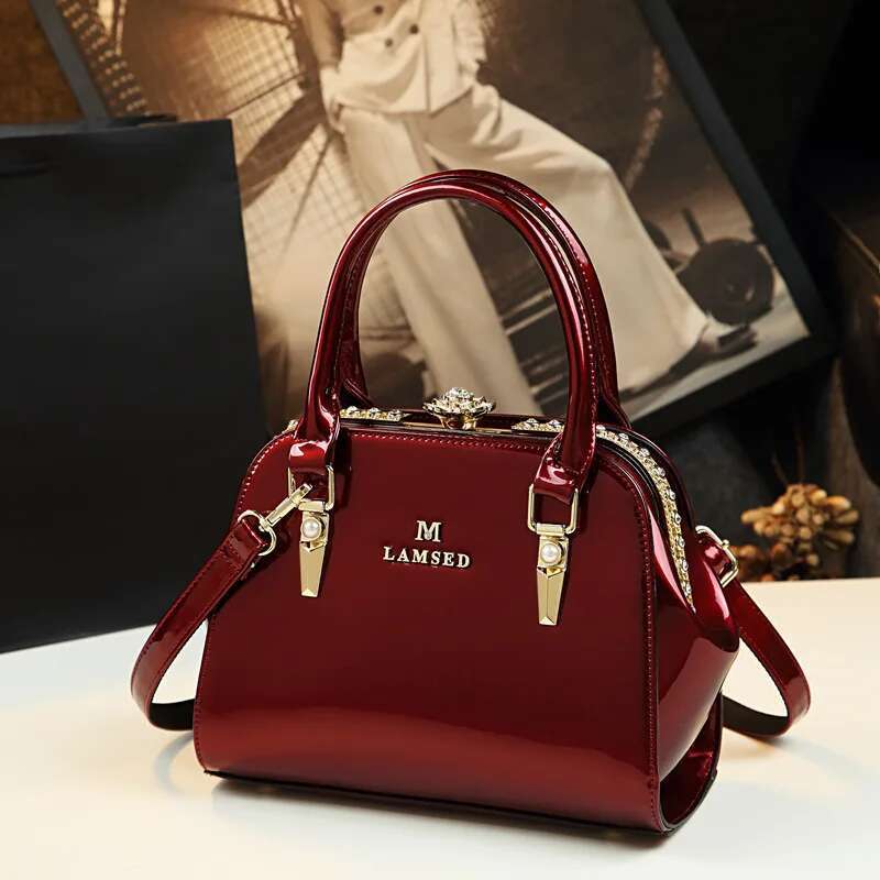 Spring new patent leather rhinestone buckle clip one-shoulder cross-body banquet dress daily pillow-shaped women's bag