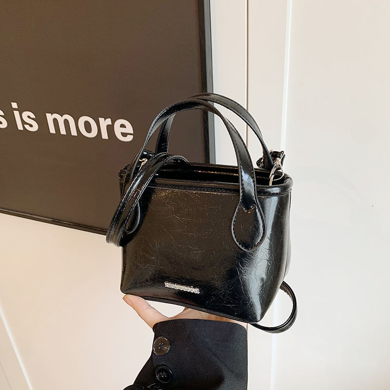 2025 New Designer Bag Free Delivery Shoes By Korean Casual Minimalist Texture Single Shoulder Hand-Held 2024 Summer Niche Design Crossbody Bucket Bag