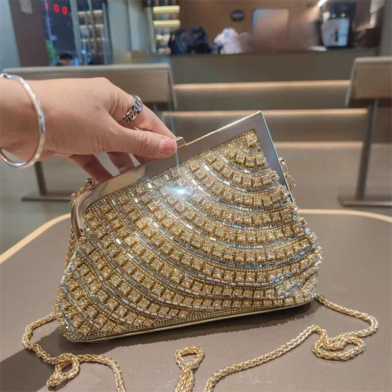 Spring and summer new metal frame rhinestone clutch crystal banquet dress chain handbag one-shoulder cross-body women's bag