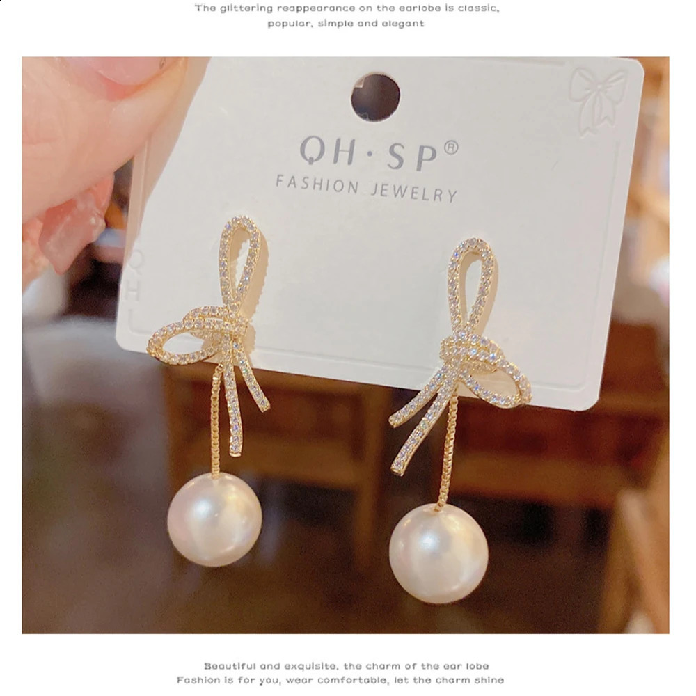 micro inlaid zircon bow hanging pearl earrings suitable for women to look slim 250422