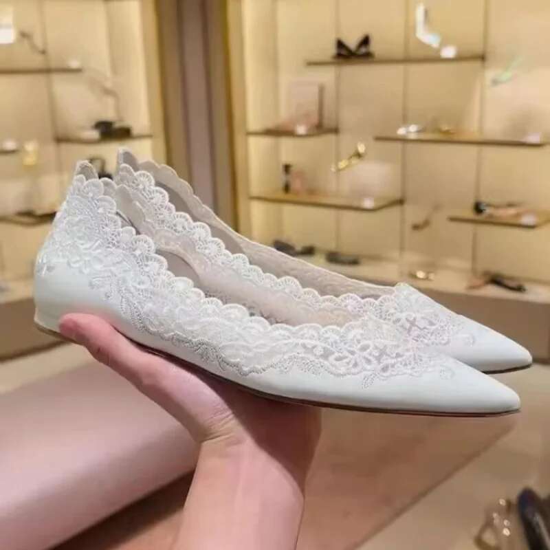 Spring and summer new pointed shallow lace hollow soft sole white wedding banquet dress versatile flat women's shoes