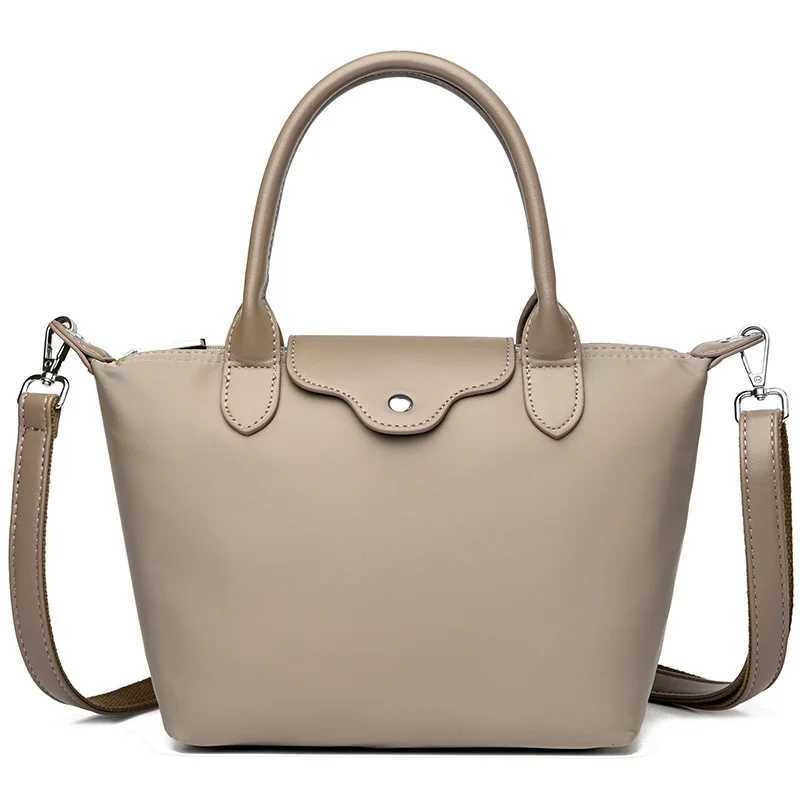 Luxury waterproof womens bag 2025 summer new messenger bag womens simple waterproof soft cloth shoulder bag W250421