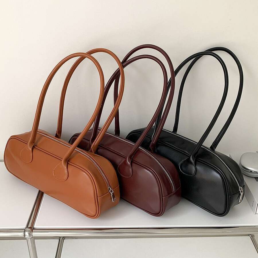 Korean niche French stick simple autumn shoulder women's high-end sense, large capacity commuting armpit bag, 2025 temperament versatile new tren