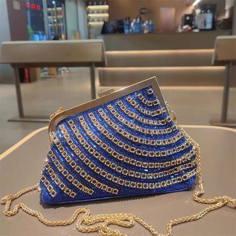 Spring and summer new metal frame rhinestone clutch crystal banquet dress chain handbag one-shoulder cross-body women's bag