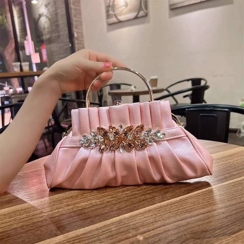 Spring and summer new rhinestone rivet wrinkled bow pearl handbag banquet dress one-shoulder cross-body chain women's bag