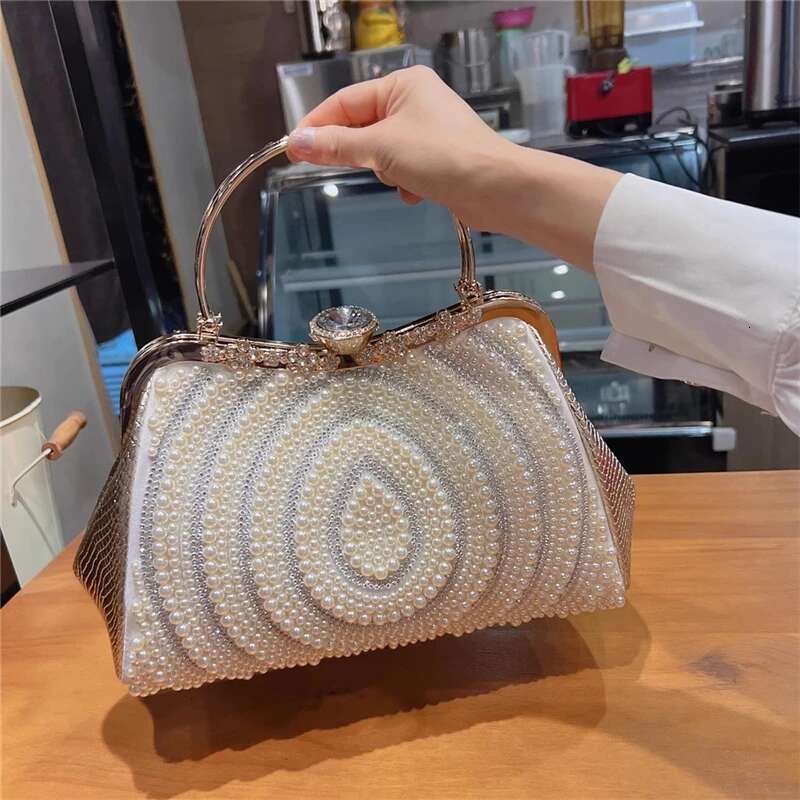 Spring and autumn new metal frame pearl dia rhinestone clip handbag daily large-capacity one-shoulder cross-body women's bag