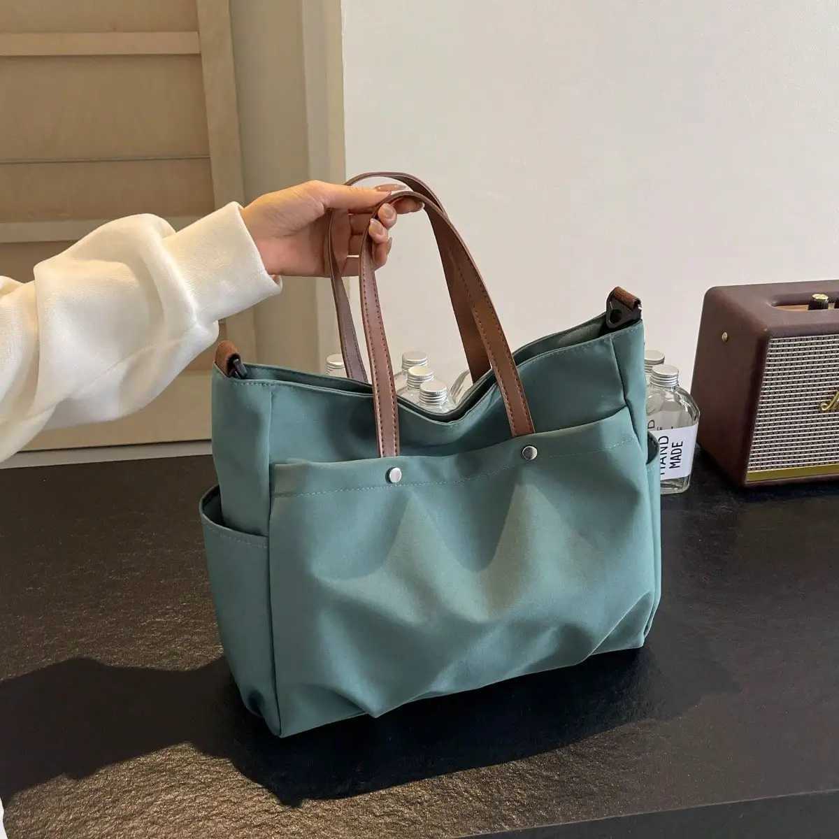 Womens multi pocket handheld handbag simple and stylish shoulder cross body bag lightweight and foldable shoulder bag W250421