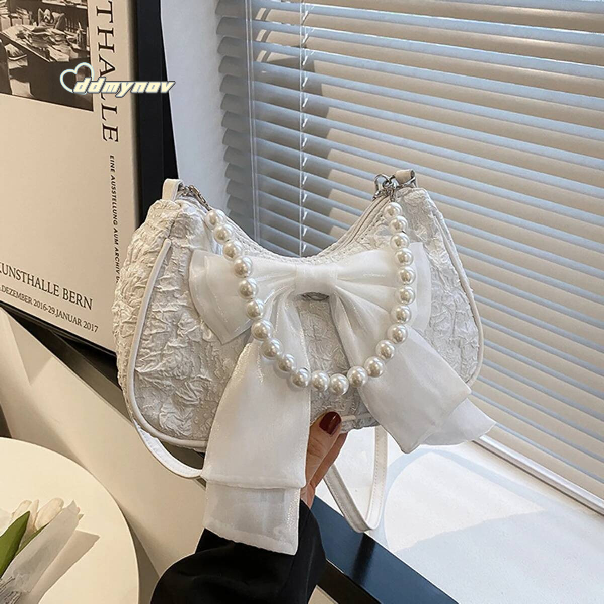 White folds pop retro bow Female Pearl handle New fashion pearl armpit shoulder crossbody bag 1 outfit ddmynov