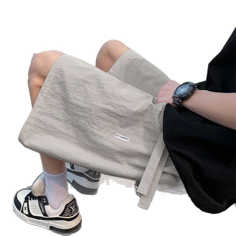 Casual 2025 summer cool, quick drying, breathable thin ice silk shorts for men's sports, loose and versatile cropped pants