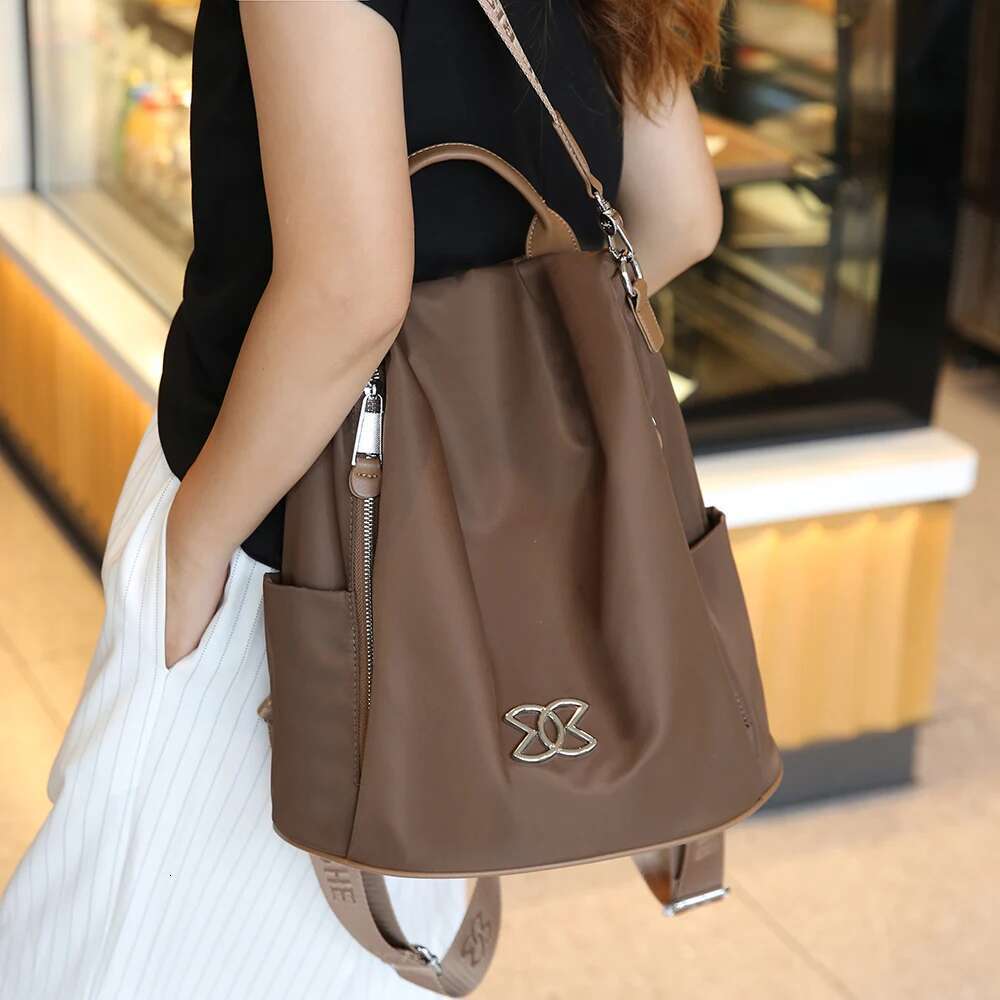 Designer bag Women 2024 New Lightweight Waterproof Large Capacity Multifunctional Casual Easiest for Match Travel Backpack School Bag