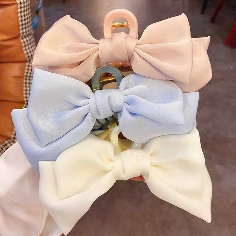 Fashion womens bow hair Korean version solid color butterfly satin hair clip girls hair accessories headbandT250425