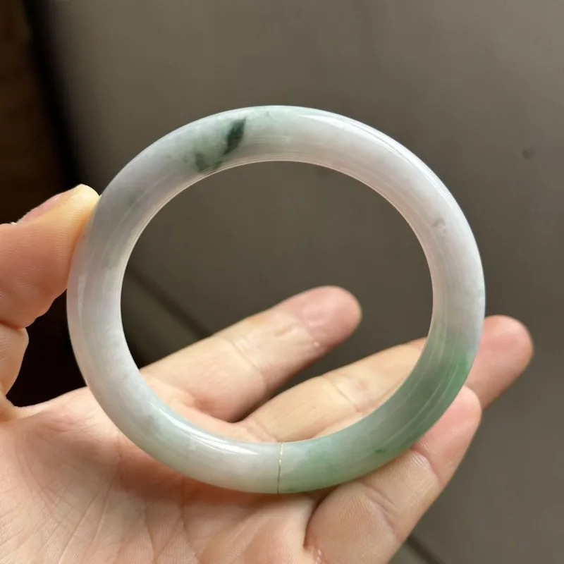 Floating green on a white background water round bar jadeite bracelet 250424